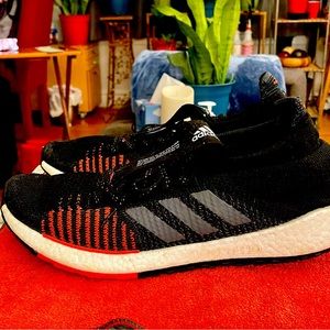 One pair of adidas Pulse Boost running shoes.